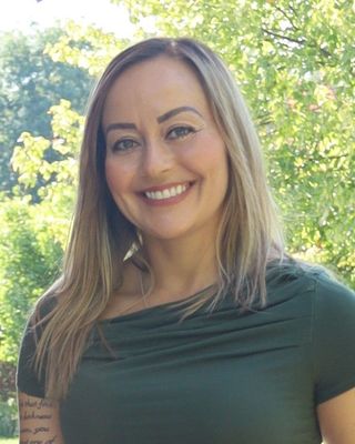 Photo of Anna Dube, Registered Social Worker, MSW, BA, BASc