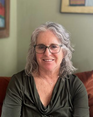 Photo of Eliza Sutton, Counselor, MS, MPH, LMHCA