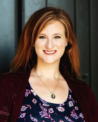 Photo of Kristy Weeks, Licensed Clinical Professional Counselor, MS LCPC, CCHT, CNLP, CSC, TTC