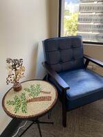 Gallery Photo of Picture of the blue therapy chair, with a separate table.