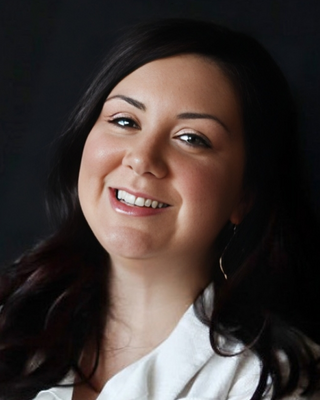 Photo of Anna Shuqom, Counselor, LCPC