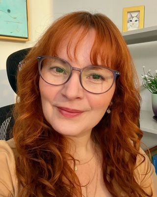 Photo of Nina Santiago - Nina Santiago | Inclusive & Integrative Therapy, Registered Psychotherapist (Qualifying), PhD, MACP