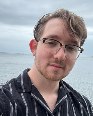 Photo of Harrison Ta-Smith, MHC-P