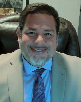 Photo of Oscar Flores Sida, MS, NCC, LCPC, LCADC, CPGC, Counselor