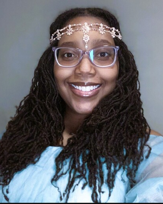 Photo of LaQuitta Johnson, LMSW, QMHP-C, Licensed Professional Counselor
