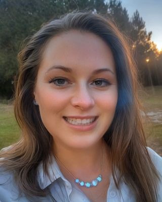 Photo of Nicole Langman, Licensed Mental Health Counselor, LMHC