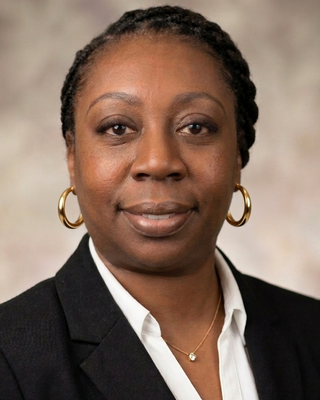 Photo of Andrea Reid, Master Social Worker, LLMSW