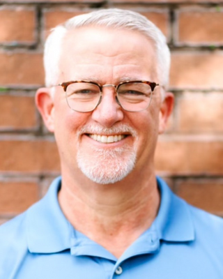 Photo of Dr. Malcolm Roberts, MD