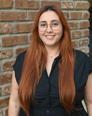 Photo of Ania Torres, Counselor, LMHC