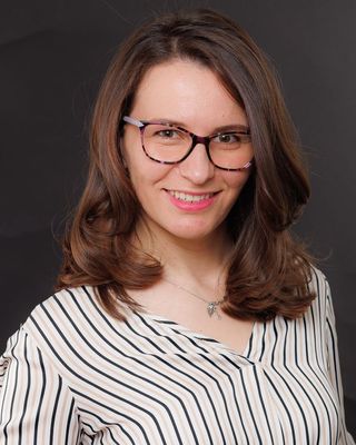 Photo of Adina Comorasu, Psychotherapist, MSc, BACP