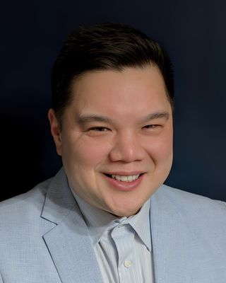 Photo of Johnson Zhong, Registered Psychotherapist (Qualifying)
