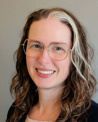 Photo of Emily Osborn, Licensed Clinical Mental Health Counselor Associate, LCMHCA, CGM, MA, NCC