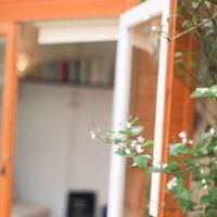 Gallery Photo of The summerhouse is cosy in winter and light and airy in summer.