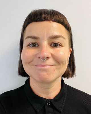 Photo of Dr Tash Walker, Psychologist, PsychD, HCPC - Clin. Psych.