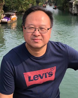 Photo of William Wang, Social Worker, AMHSW