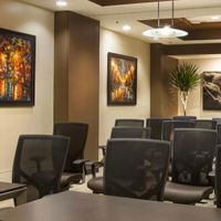 Gallery Photo of The warm tones and inviting lighting of the indoor common areas give an inviting therapy vibe. I want my patients at ease as soon as they walk in!