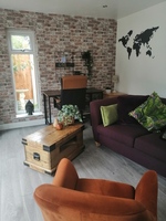 Gallery Photo of The therapy room is spacious and airy with an open aspect onto a garden.