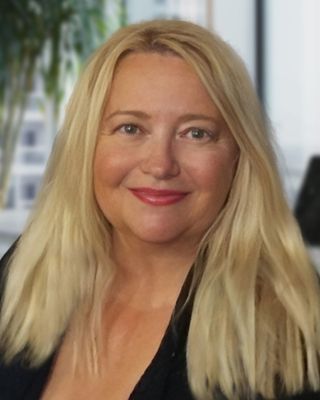 Photo of Laura Smigielski, Licensed Professional Counselor, MA, NHA, LPC