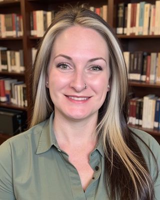 Photo of Marci McClure, Licensed Mental Health Counselor, LMHC