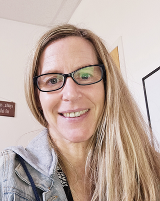 Photo of Dina Huth, Licensed Professional Counselor, LPC