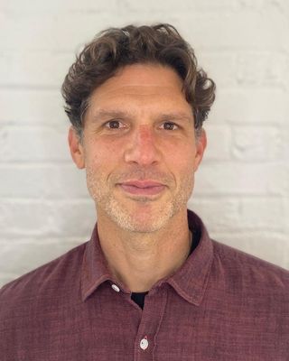 Photo of Alex Sauer, Licensed Clinical Mental Health Counselor, MA, JD, LCMHC, LMHC, LPC