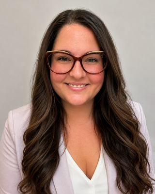 Photo of Catherine Schmidlin, Licensed Professional Counselor, MA, LPC, NCC, CTP