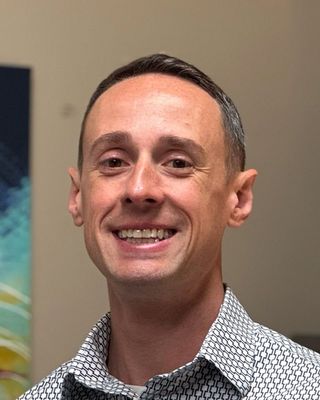 Photo of Tyler Oswald, Counselor, MA, LMHC