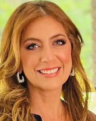 Photo of Dr. Celena Dancourt, Psychiatrist, MD