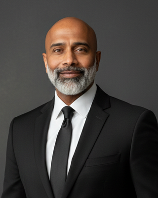 Photo of Dr. Les Aria, Psychologist, PhD
