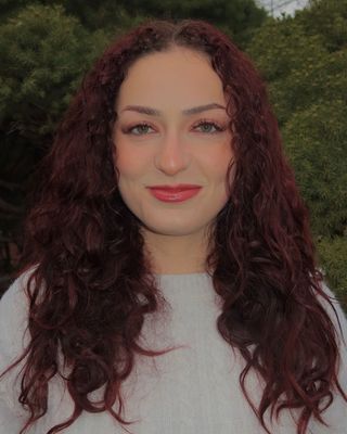 Photo of Emily Ostella, Registered Psychotherapist (Qualifying), BAs, MA