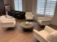 Gallery Photo of Cozy waiting room with ample seating allow you to relax and enjoy a cup of coffee before treatment.