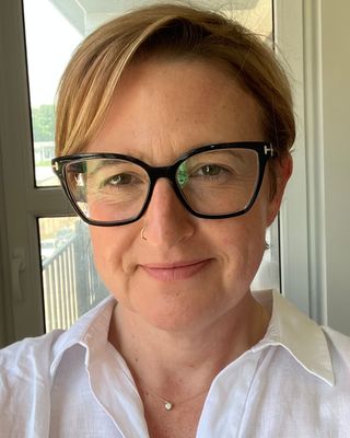 Photo of Rhiannon Fink, Licensed Professional Counselor, MA, LCPC, LAC