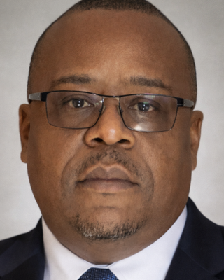 Photo of Dominic Omwenga, Psychiatric Nurse Practitioner, NP