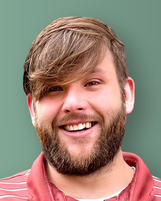 Photo of Justin Michaud, Counselor, LCPC