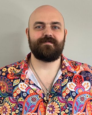 Photo of Austin M Wiginton, Counselor, MS, ALC