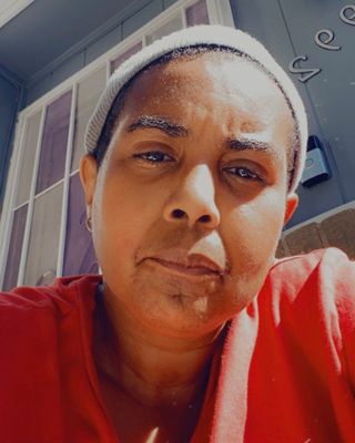 Photo of Dr. Rain Latchman, Licensed Professional Counselor, PsyD, JD, MDiv, CAT, ADS
