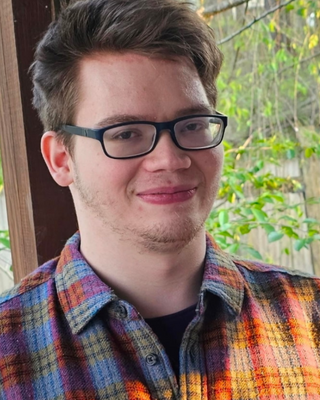 Photo of Garrett Noid, Licensed Clinical Mental Health Counselor, LCMHC, LCASA