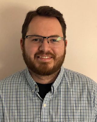 Photo of Cameron McMullen, Registered Psychotherapist (Qualifying), MA, RP(Q)