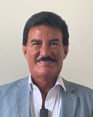 Photo of Dr. Carlos Torrellas, Psychiatrist