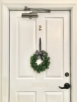 Gallery Photo of In order to ensure confidentiality of services, and to help you feel more welcomed, I hang a wreath on my door rather than a marketing sign.