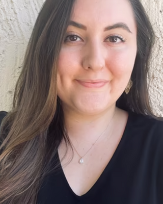 Photo of Emily Poulos, Licensed Professional Clinical Counselor, LPCC