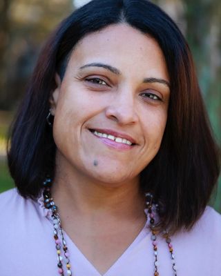 Photo of Dr. Erica Ortiz-Pellicer, Licensed Mental Health Counselor, Ed.D., LMHC