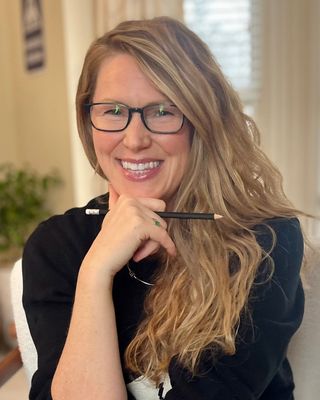Photo of Kelly Hurd, MEd, CLC, CHC, RYT