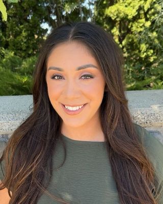 Photo of Reina Escamilla, Licensed Mental Health Counselor, MSW, LMHC