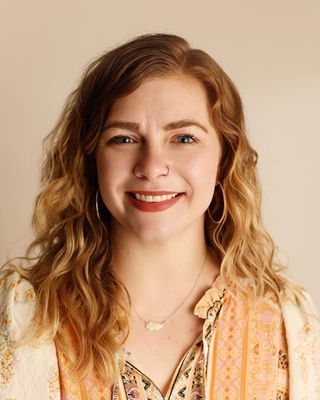 Photo of Kait Towner, Licensed Mental Health Counselor, LMHC, RPT-S, CCPT, PMH-C
