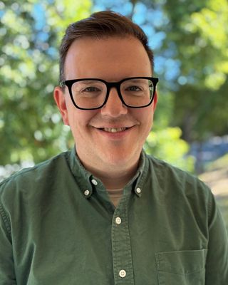 Photo of Chris Wilson, Psychologist, PsyD, LP, HSP-P