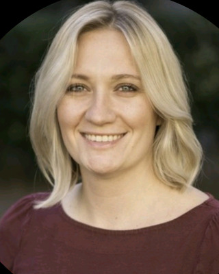 Photo of Karina Mueller, LCSW, CCPS-C, MSSW, MPA