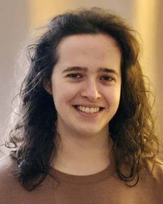 Photo of Justine Mota, Registered Psychotherapist (Qualifying), BDes, MACP