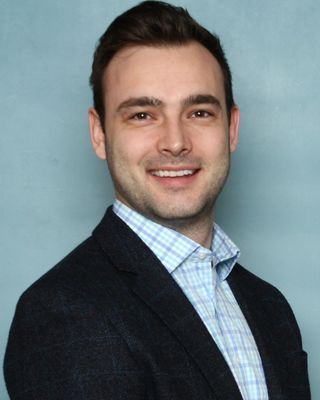Photo of Dr. Dustin Marcinkevics, PhD, MEd, BSc, Psychologist