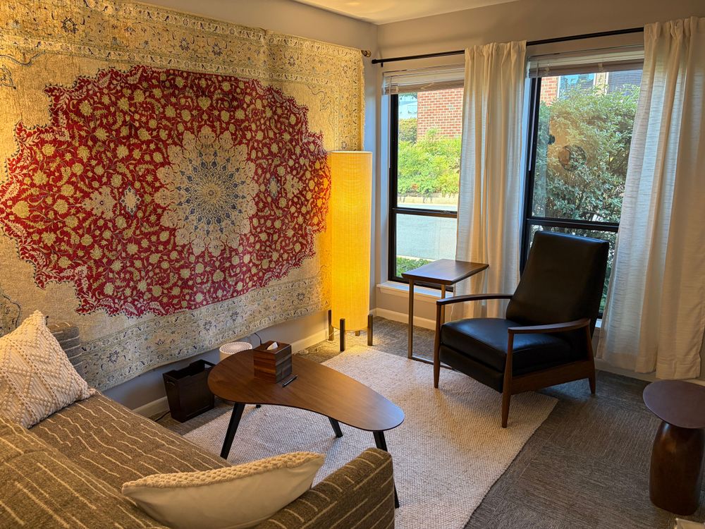 The office includes ample parking, 1-way windows for privacy, and comfortable seating for individuals and couples. 